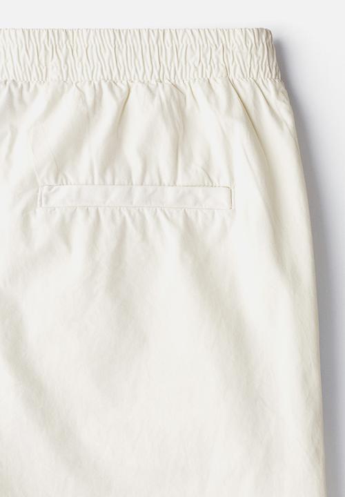 H&M - Relaxed fit cotton trousers - cream