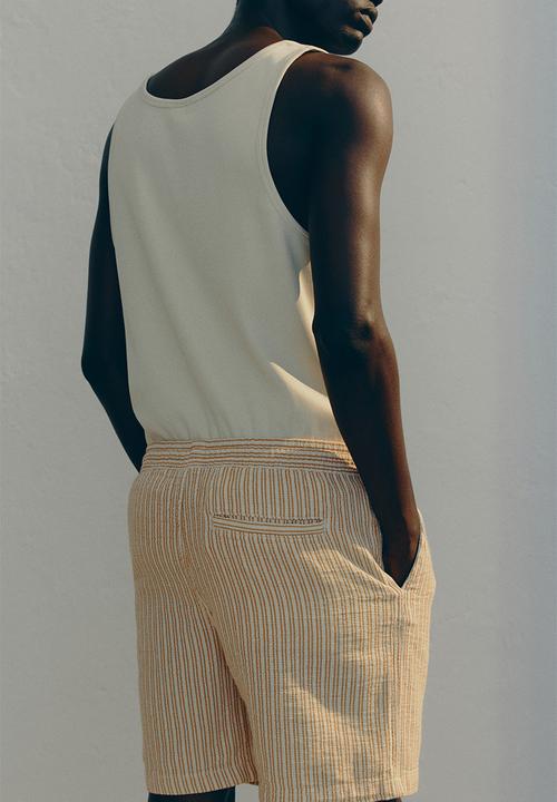 H&M - Regular fit woven shorts - yellow striped