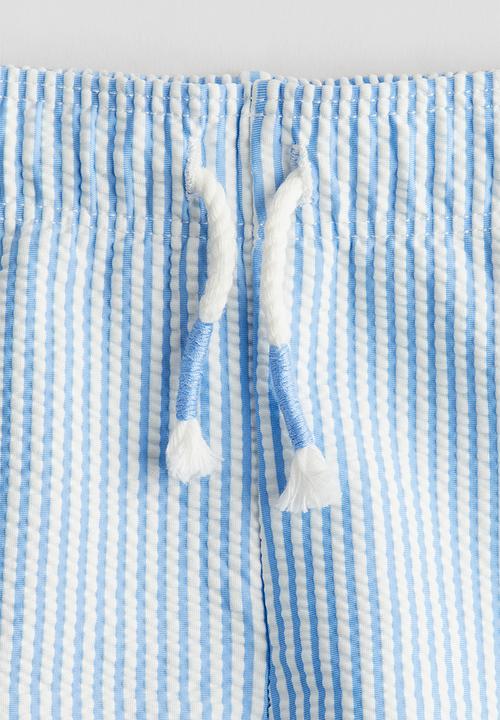 H&M - Patterned swim shorts - light blue striped