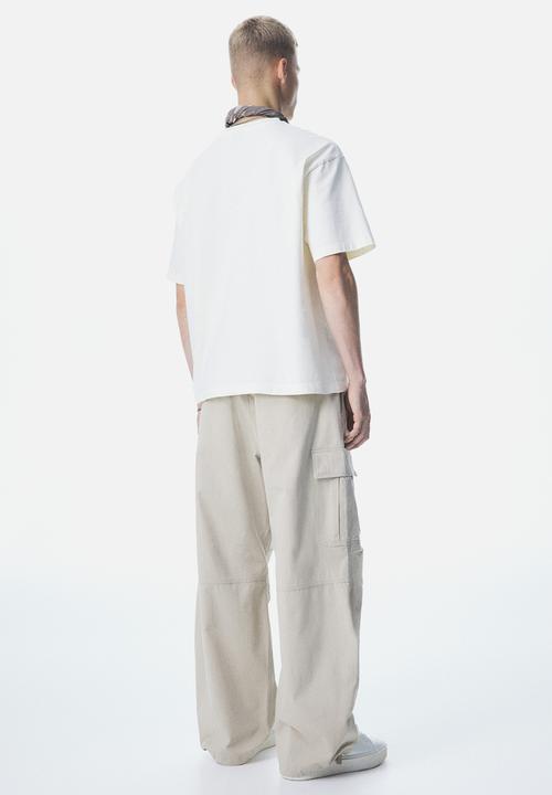 H&M - Loose fit cargo trousers - beige