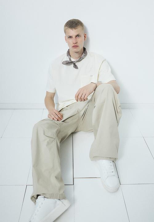 H&M - Loose fit cargo trousers - beige