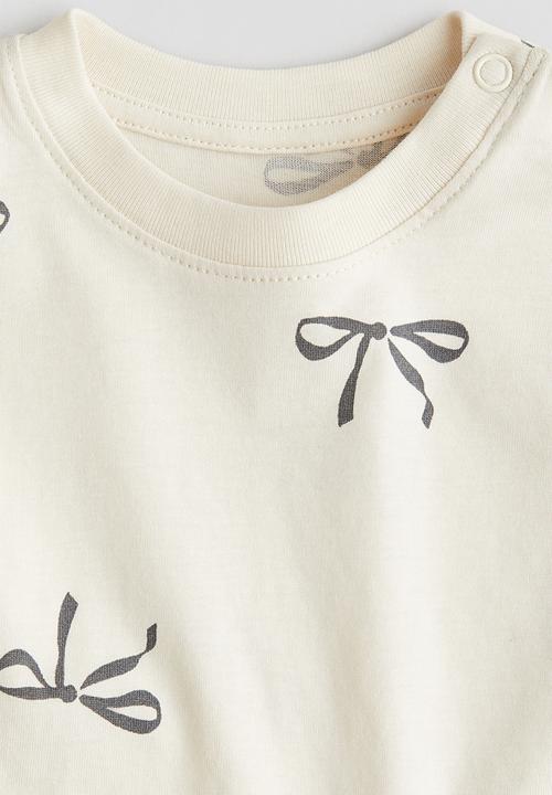 H&M - Printed cotton top - beige bows
