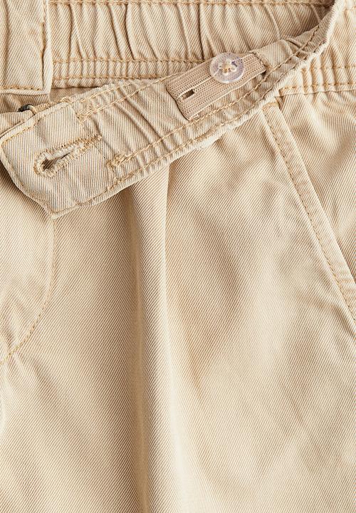 H&M - Loose-fit tapered twill chinos - beige