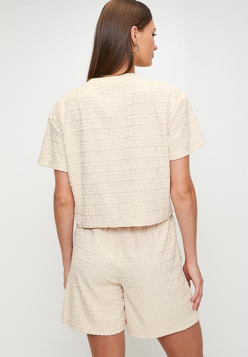 Steve Madden - Ladies bella embossed logo jogger shorts - stone