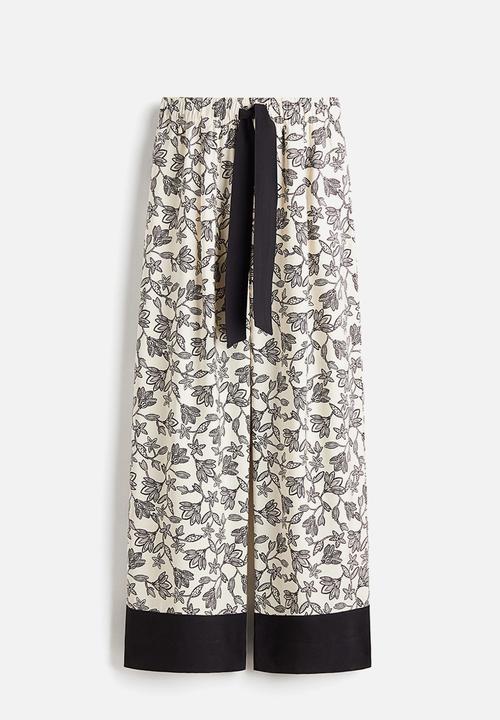 H&M - Wide tie-belt trousers - cream/floral 