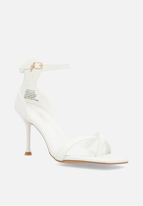 Miss Black - Chanel 4 toe-loop heel - white