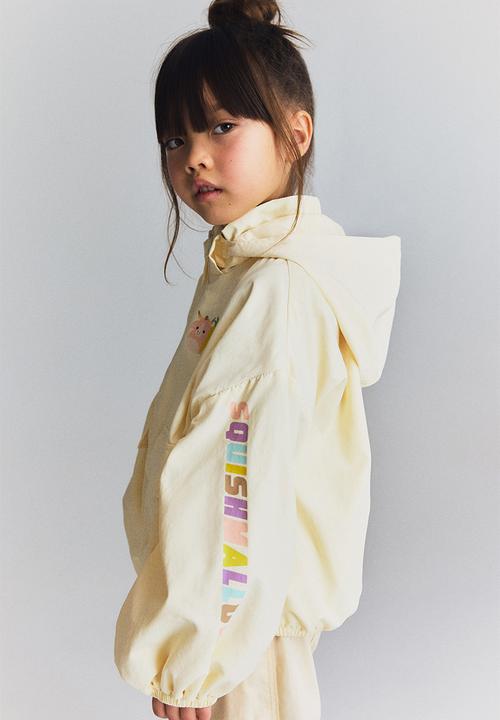 H&M - Printed windbreaker - light yellow squishmallows