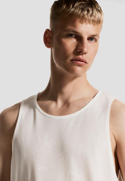 H&M - Regular fit sports vest top with drymove™ - white