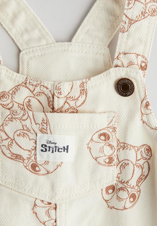 H&M - Printed dungaree dress -  cream/lilo & stitch 