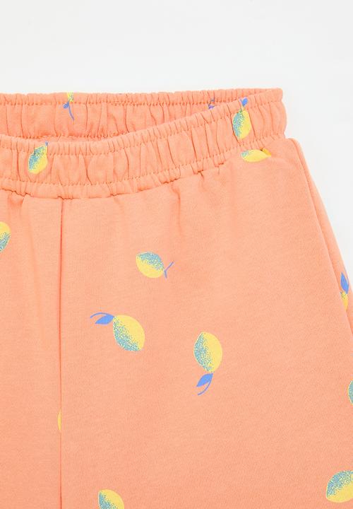 Pop Candy - Lemon all-over-print shorts - orange