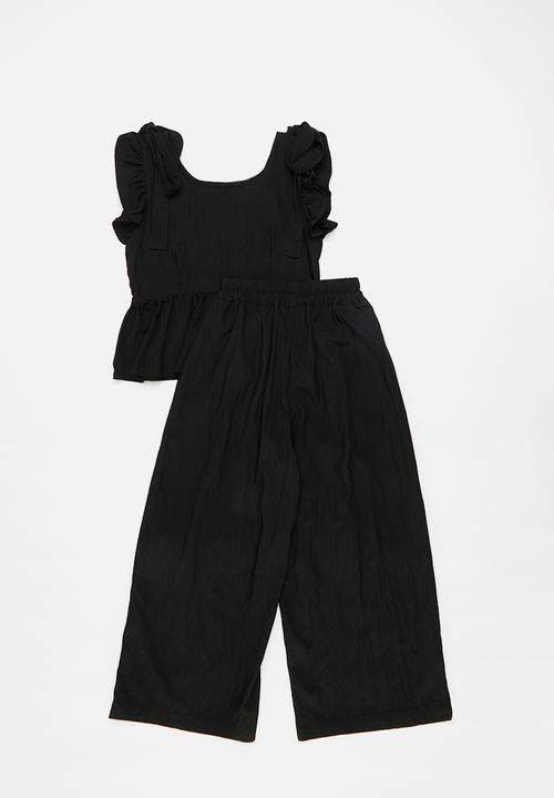 Pop Candy - Peplum top jumpsuit with gathered sleeves - black