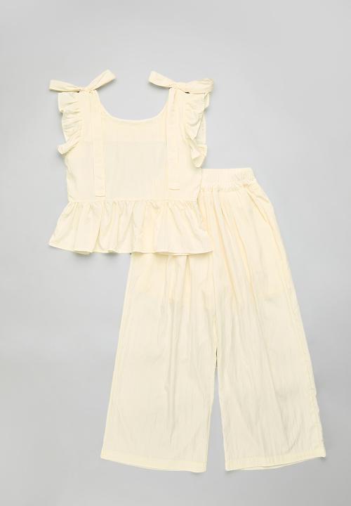 Pop Candy - Peplum top with wide leg pants - light yellow