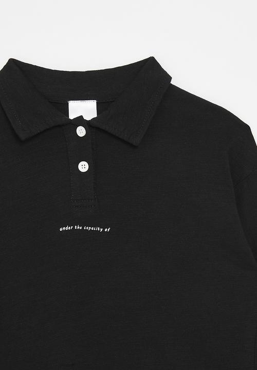 Pop Candy - Henley-style shirt with slogan - black/under the capacity of