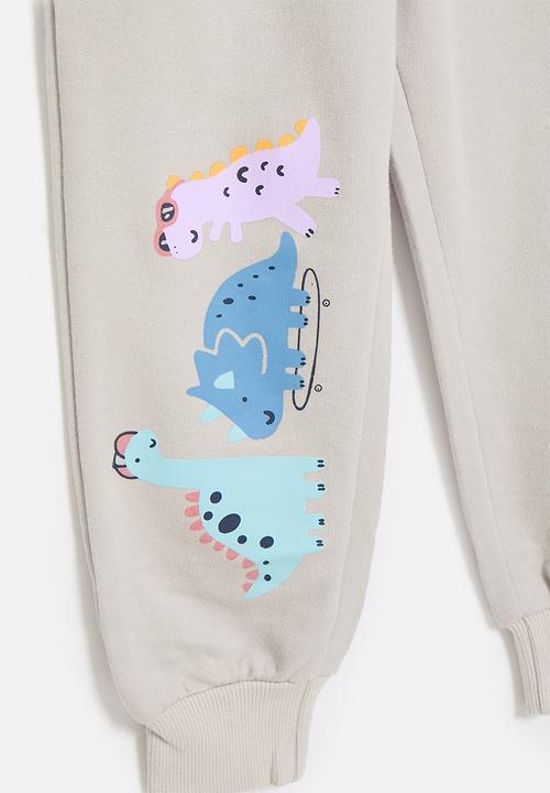 Pop Candy - Graphic and slogan print jogger - beige/dinosaur club