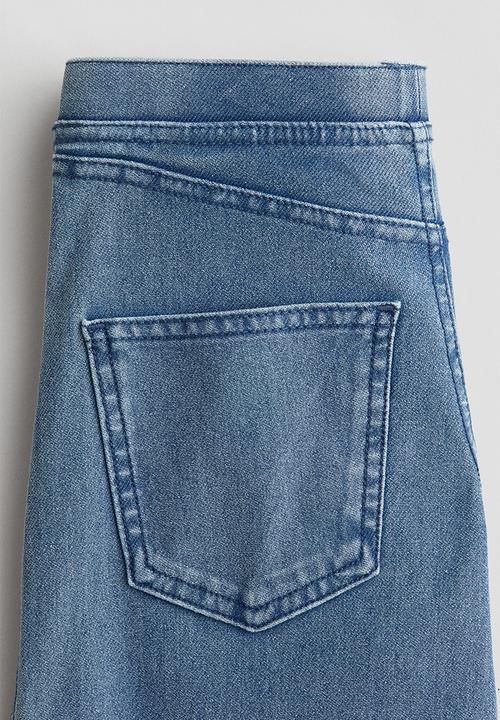 H&M - Wide denim-look trousers - denim blue/mickey mouse 