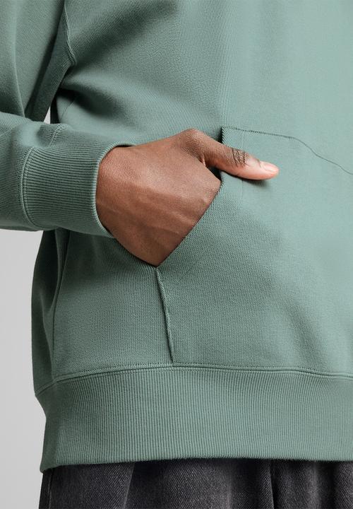 PUMA - Essentials Relaxed Half Zip Crew Sweatshirt - Green