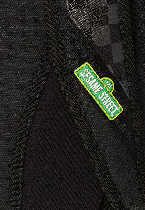Sprayground - Sesame street cookie monster sneaking a bite dlxsv backpack - black