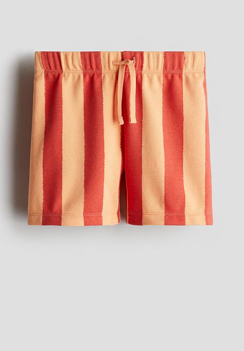 H&M - Printed sweatshorts - red & orange striped