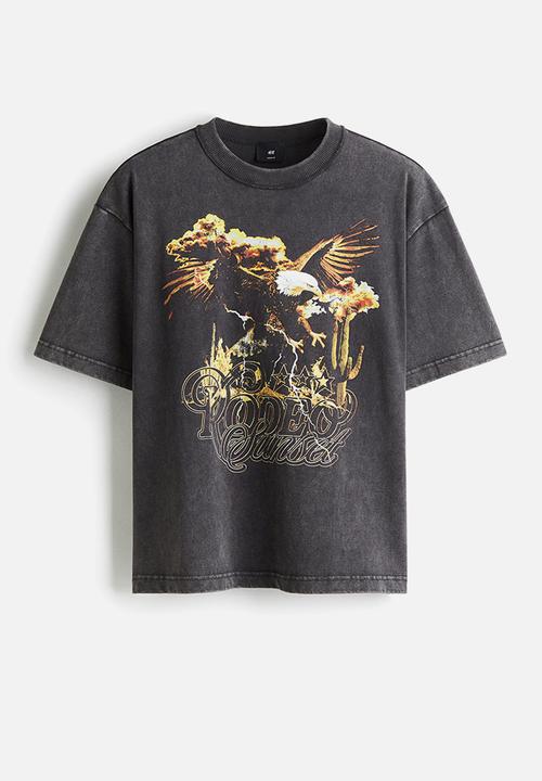 H&M - Loose fit printed t-shirt - vintage black rodeo sunset