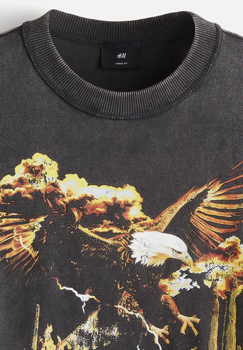 H&M - Loose fit printed t-shirt - vintage black rodeo sunset