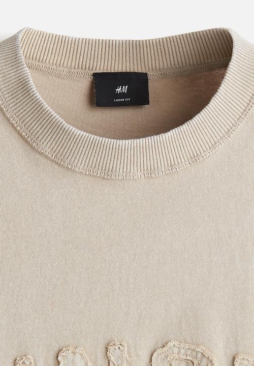 H&M - Loose fit printed t-shirt - beige sunset