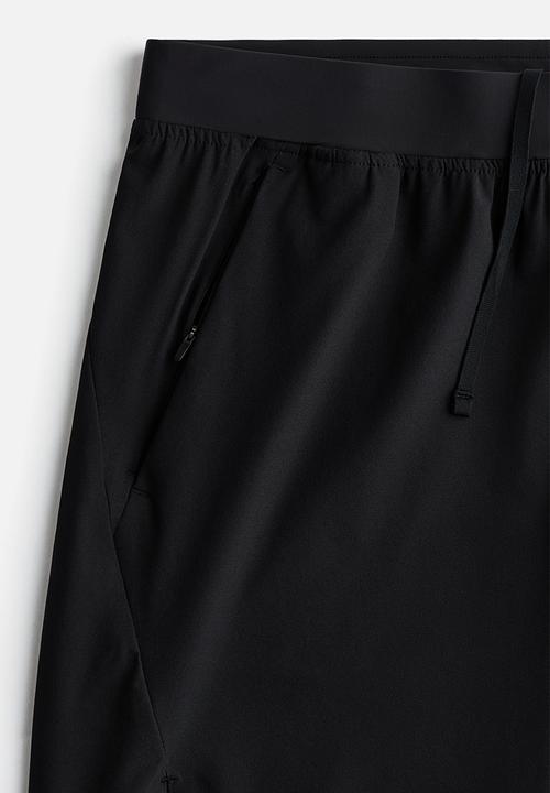 H&M - Mid-length sports shorts with drymove™ - black