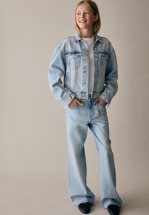 H&M - Baggy fit bootcut leg jeans - light denim blue teddy bear