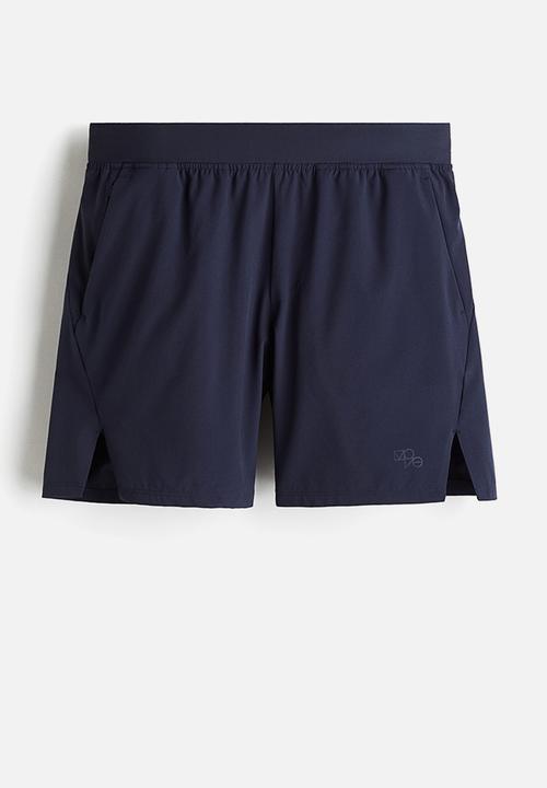 H&M - Mid-length sports shorts with drymove™ - navy blue