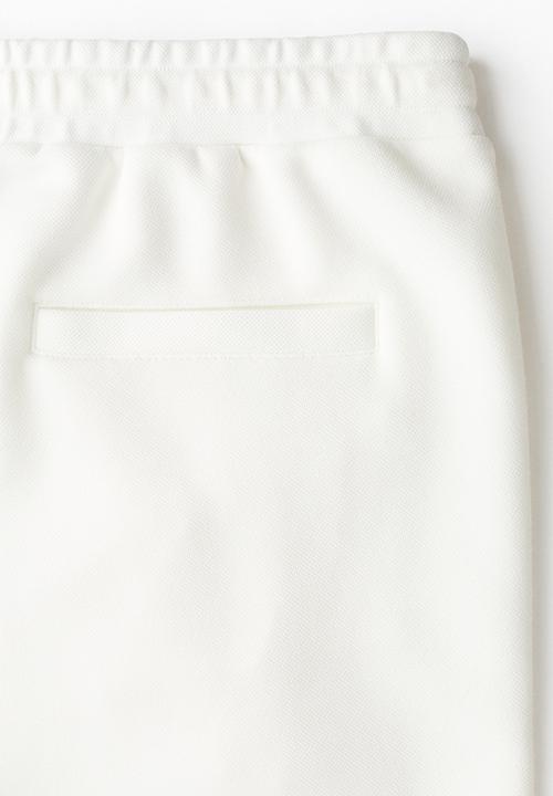 H&M - Regular fit tailored joggers - white