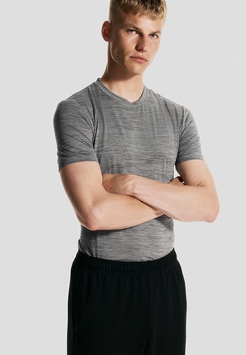 H&M - Muscle fit sports top with drymove™ - dark grey marl 