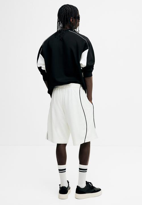 H&M - Relaxed fit mesh shorts - white