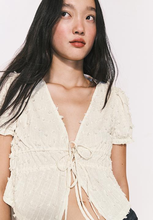 H&M - Plumeti tie-front top - cream
