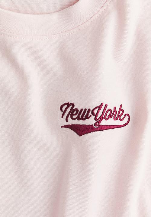 H&M - Oversized cotton t-shirt - light pink new york 