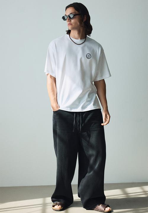H&M - Loose fit printed T-shirt - white destined beyond 