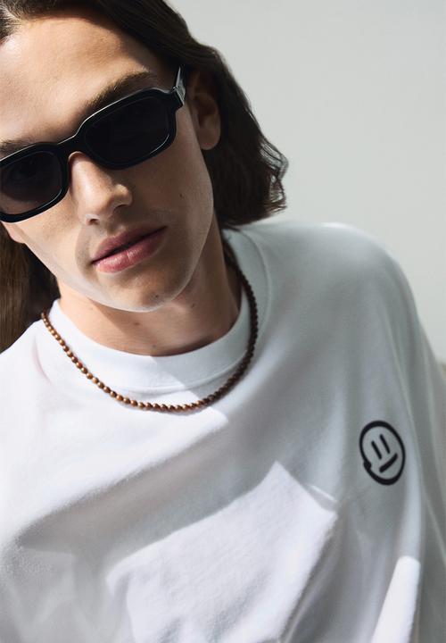 H&M - Loose fit printed T-shirt - white destined beyond 