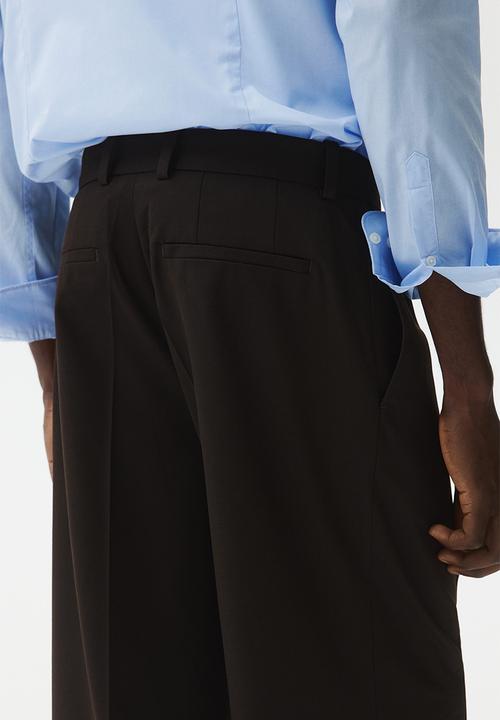 H&M - Loose fit tailored trousers - dark brown 