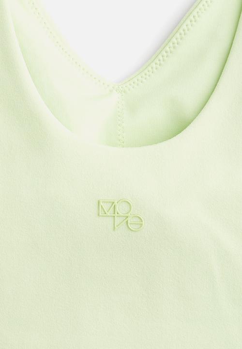 H&M - Medium support yoga bra with softmove™ lycra® - light green