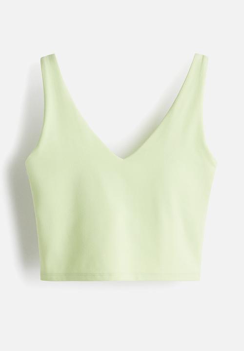 H&M - Medium support yoga bra with softmove™ lycra® - light green