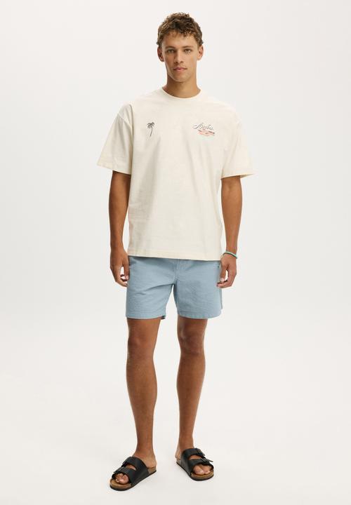 Cotton On - Box Fit Graphic T-shirt - Creampuff/Aruba
