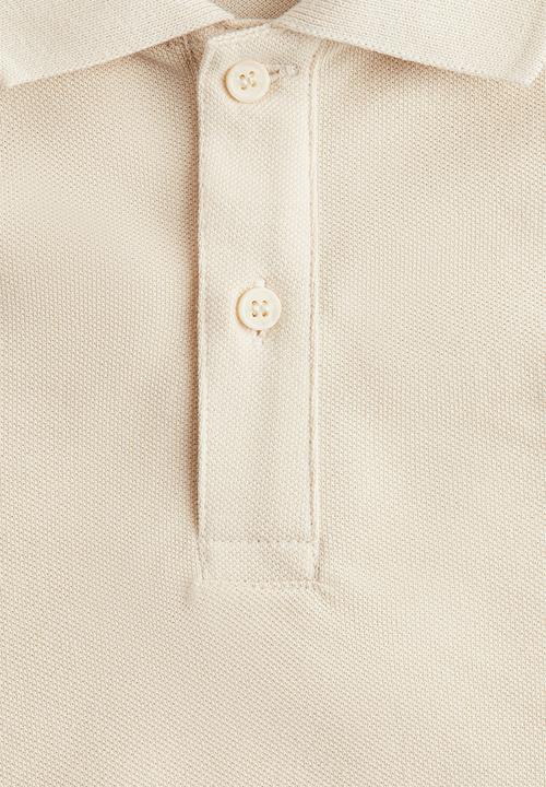 H&M - Cotton piqué polo shirt - light beige