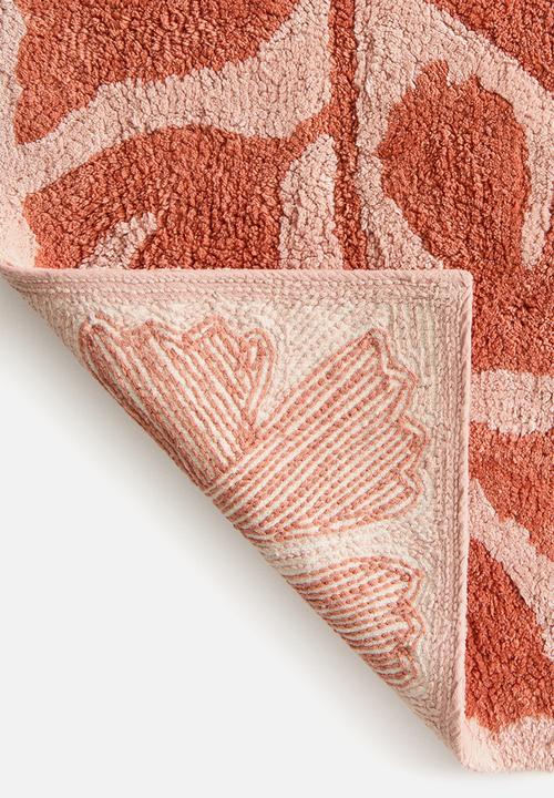 H&M - Tufted cotton bath mat -  rust red/floral