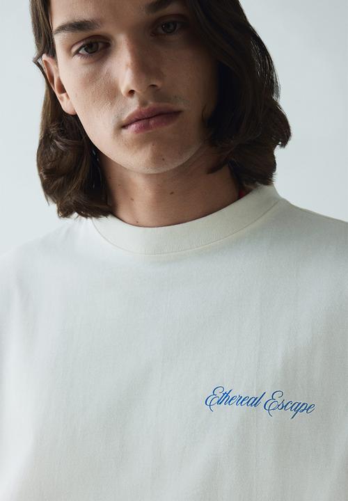 H&M - Oversized fit printed t-shirt - white ethereal escape