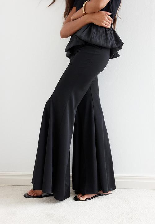 H&M - Flared trousers - black
