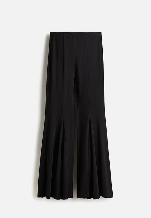 H&M - Flared trousers - black