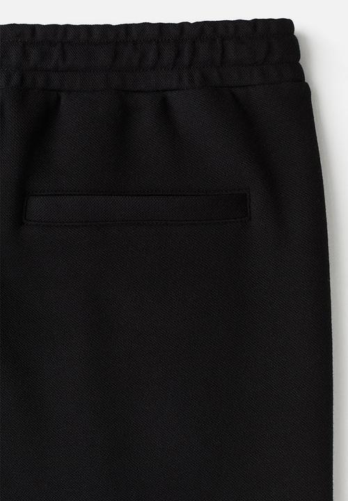 H&M - Regular fit tailored joggers - black