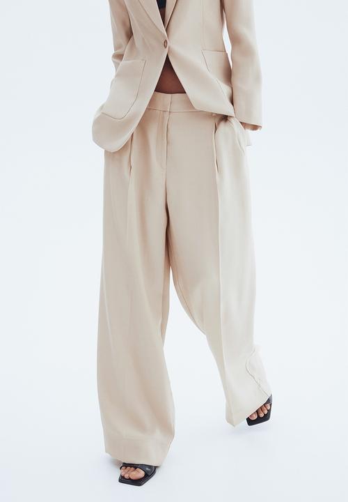H&M - Wide tailored trousers - light beige