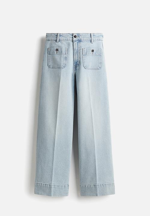H&M - Wide high ankle jeans - light denim blue