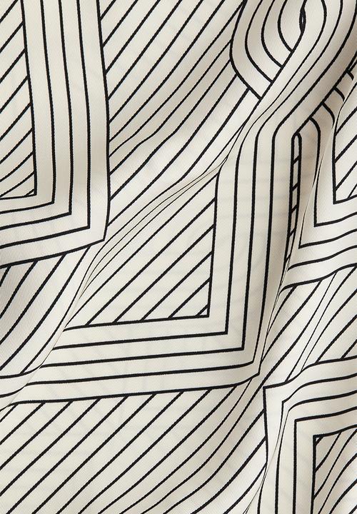 H&M - Wide trousers - cream patterned 