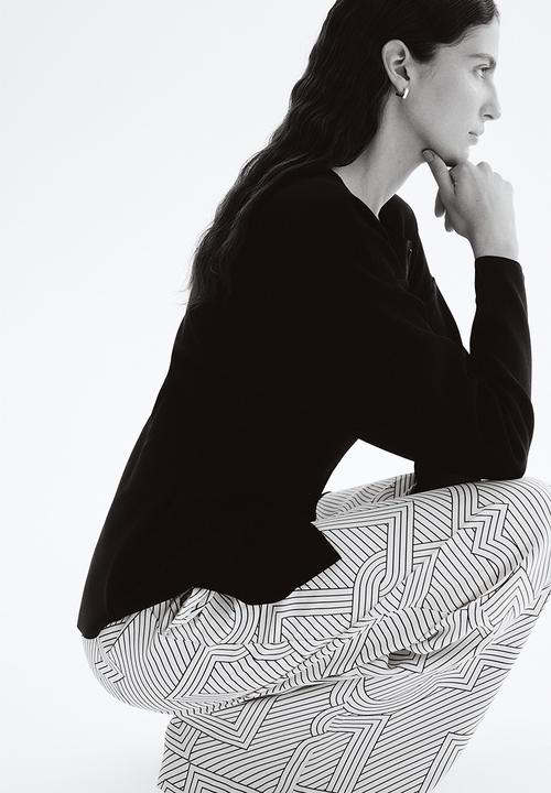 H&M - Wide trousers - cream patterned 
