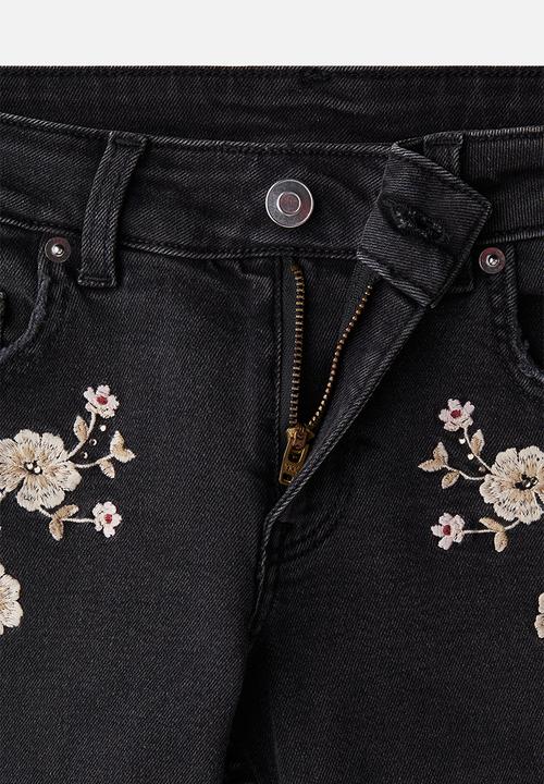 H&M - Flared low jeans - dark grey flowers 